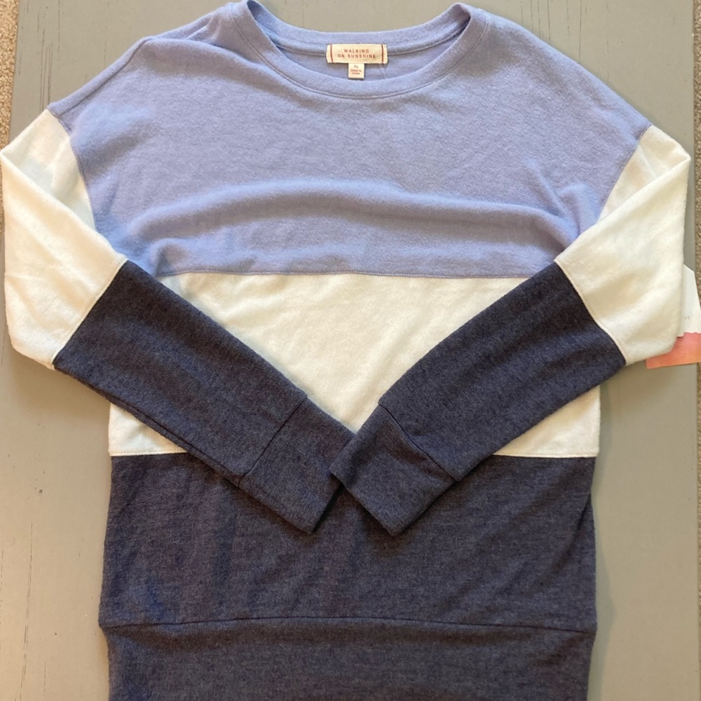 XL kids long sleeve pull over from Stitch Fix. The brand is Walking on Sunshine